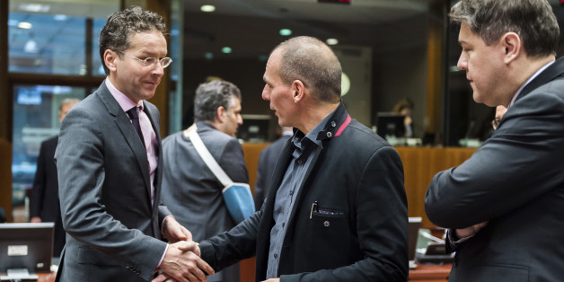 Greece's Finance Minister Yanis Varoufakis, center, greets Dutch Finance Minister Jeroen Dijsselbloem, left, as Croatian Finance Minister Boris Lalovac looks on during a meeting of EU finance ministers at the EU Council building in Brussels Tuesday, Feb. 17, 2015. Greek shares led a European retreat Tuesday as investors reacted negatively to the breakdown in talks between Greece and its creditors in the 19-nation eurozone over the country's attempt to renegotiate its financial bailout. (AP Photo
