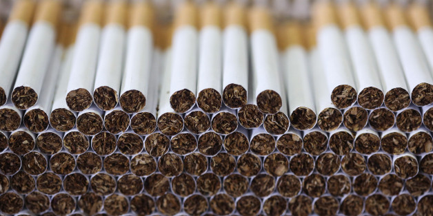 Lambert and Butler cigarettes, manufactured by Imperial Tobacco Group Plc, sit stacked ahead of packaging at the company's factory in Nottingham, U.K., on Friday, Feb. 1, 2013. Imperial Tobacco Group Plc is Europe's second-biggest tobacco company and generates about 40 percent of its profit from the region. Photographer: Chris Ratcliffe/Bloomberg via Getty Images