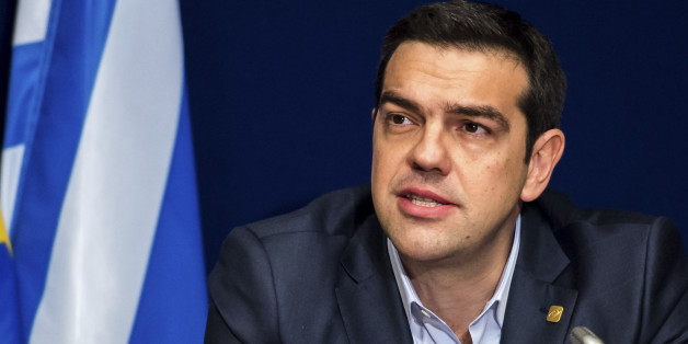 Greek Prime Minister Alexis Tsipras speaks during a media conference after an EU summit in Brussels on Thursday, Feb. 12, 2015. European Union leaders on Thursday said the full respect of the planned weekend cease-fire in eastern Ukraine will be essential before there could be a change in the sanctions regime imposed on Moscow. (AP Photo/Geert Vanden Wijngaert)