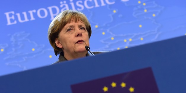 German Chancellor Angela Merkel speaks during a press conference at the end of an European Council leaders summit in Brussels on February 12, 2015. AFP PHOTO / EMMANUEL DUNAND (Photo credit should read EMMANUEL DUNAND/AFP/Getty Images)