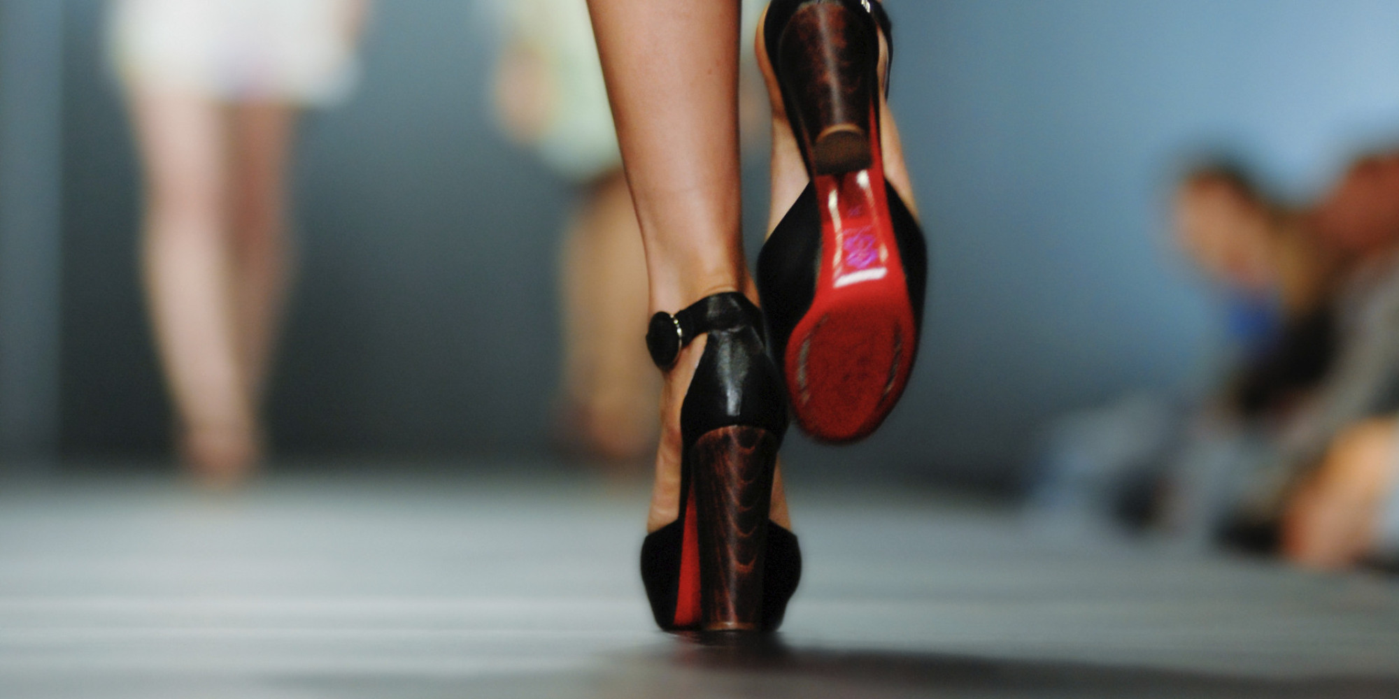fashion show runway aisle seated legs