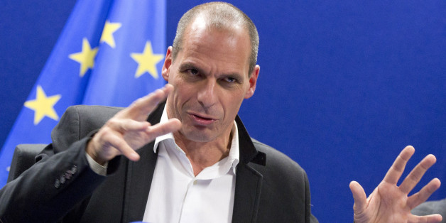 Greek Finance Minister Yanis Varoufakis speaks during a media conference after a meeting of eurogroup finance ministers in Brussels on Friday, Feb. 20, 2015. Eurozone finance ministers meet for a crucial day of talks Friday to see whether a Greek debt relief proposal is acceptable to Germany and other nations using the common currency. (AP Photo/Virginia Mayo)