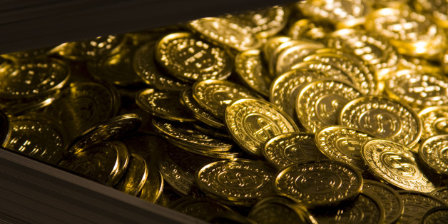 Gold coins in a metal case.