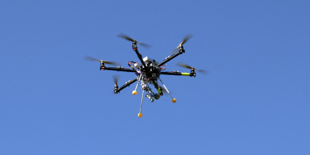 A drone flies at the Abbaye Des-Vaux-de-Cernay, southwest of Paris, Thursday March 20, 2014. French drone operator Jean-Luc Fornier operated the remote controlled drone used to used to transmit live video of snowboard and ski jump competitions at the Sochi Olympic Games. (AP Photo/Bertrand Combaldieu)