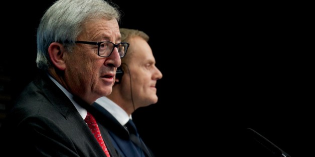 BRUSSELS, BELGIUM - FEBRUARY 12: European Commission President Jean-Claude Juncker (L) and European Council President Donald Tusk (R) hold a press conference after the European Union Leaders Summit at the European Council headquarters in Brussels, Belgium, on February 12, 2015. (Photo by Dursun Aydemir/Anadolu Agency/Getty Images)