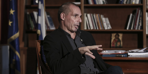 Yanis Varoufakis, Greece's finance minister, speaks during a Bloomberg Television interview at his office in Athens, Greece, on Wednesday, Feb. 25, 2015. Varoufakis said he's counting on the European Central Bank to help the country avert default when it runs out of money next month, while bank deposits are also starting to flow back. Photographer: Yorgos Karahalis/Bloomberg via Getty Images