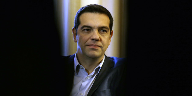 Greece's Prime Minister Alexis Tsipras listens to Greek President Karolos Papoulias during their meeting at Presidential Palace in Athens, Wednesday, Feb. 18, 2015. Greece was preparing Wednesday to present its creditors with an official proposal aimed to save bailout talks from collapse, as time is running out for a deal that would keep the country solvent and within the euro currency bloc. Germany, the main European creditor, was quick to say it was skeptical of any new proposals. (AP Photo/Thanassis Stavrakis)