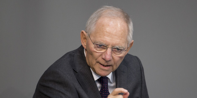 German Finance Minister Wolfgang Schaeuble speaks at the German parliament, the Bundestag in Berlin on Friday, Feb. 27, 2015. The Bundestage will decide Friday about extension of financial help for Greece. (AP Photo/Axel Schmidt)