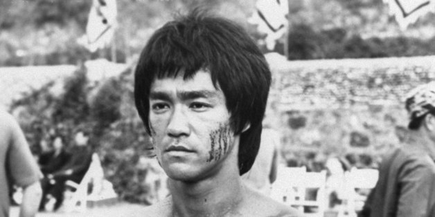 Bruce Lee is shown in a scene from the 1973 film, "Enter the Dragon," completed shortly before the martial arts stars' death of brain edema in 1973. (AP Photo/HO)