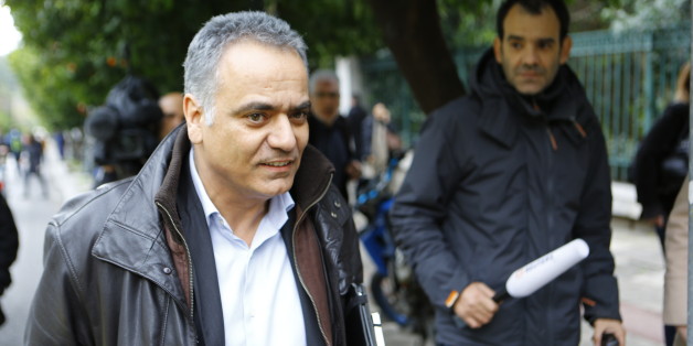 MAXIMOS MANSION, ATHENS, ATTICA, GREECE - 2015/01/27: Panos Skourletis, the new Labour Minister, walks through the waiting press after leaving the Maximos Mansion. (Photo by Michael Debets/Pacific Press/LightRocket via Getty Images)