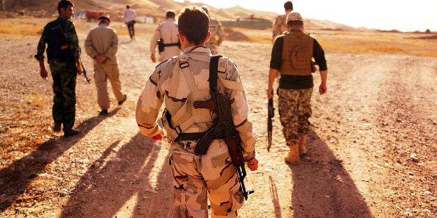 Die Religion auf den Arm tätowiert - Christen fliehen derzeit vor ISIS im irak