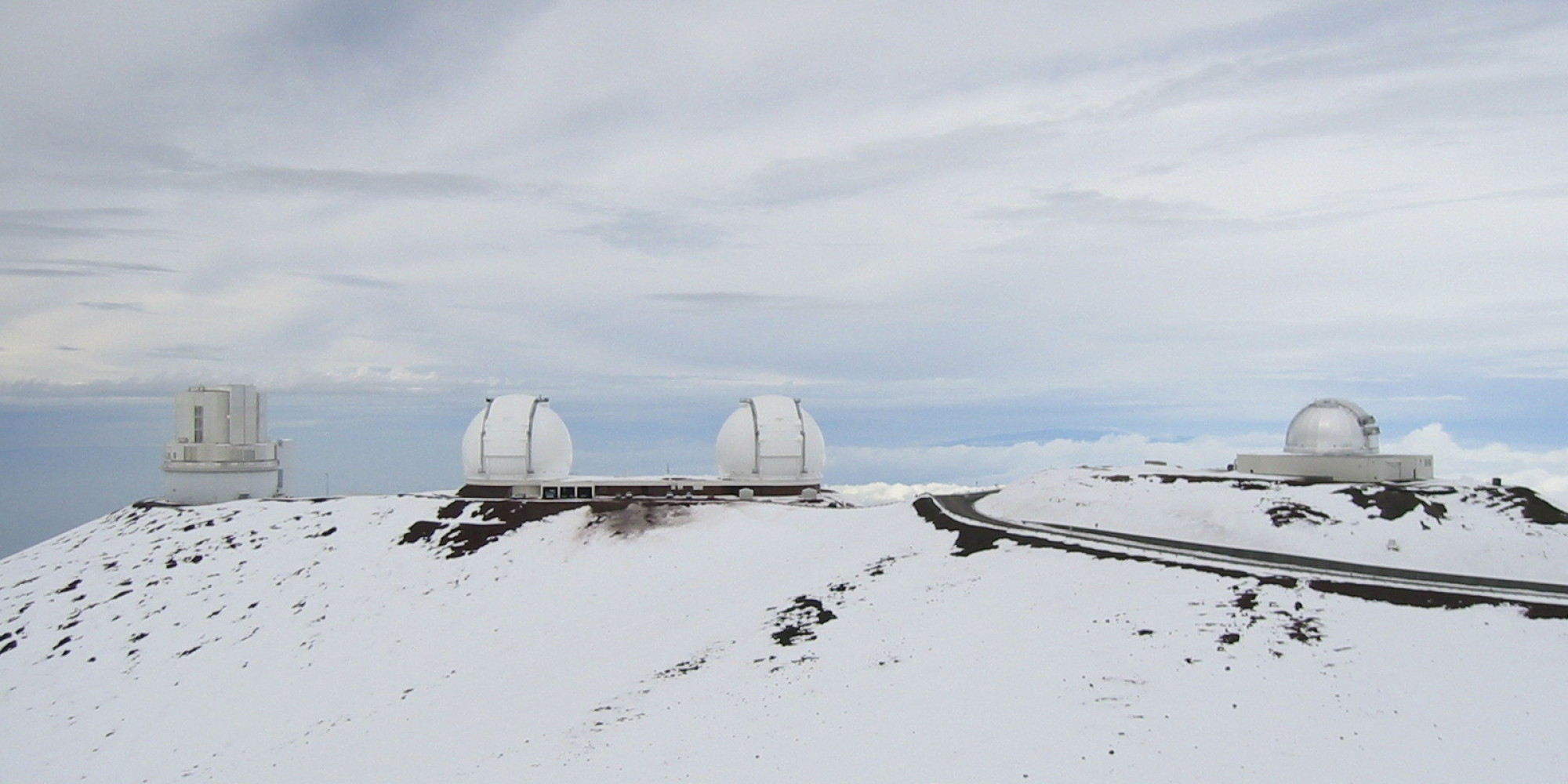 Even Hawaii's Mauna Kea Is Covered In Snow, Aka Winter May NEVER End