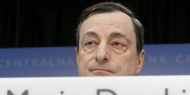 FILE - In this Feb. 6, 2014 file photo, President of European Central Bank Mario Draghi speaks during a press conference following the meeting of the governing council in Frankfurt, Germany. An adviser to the European Court of Justice says the European Central Bank's offer to purchase government bonds of troubled countries, a key backstop in Europe's struggle against its debt crisis, is compatible in principle with the basic EU treaty. (AP Photo/Michael Probst, File)