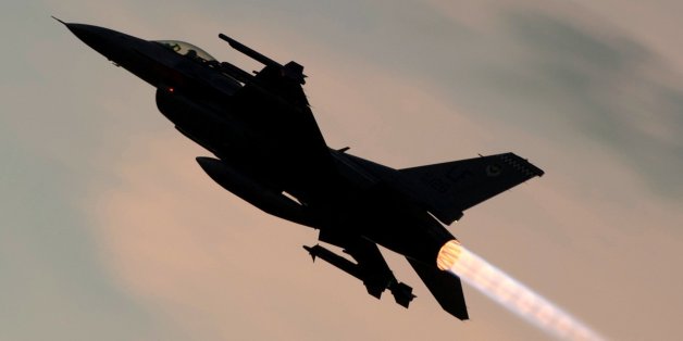 Edited USAF image of an F-16 in flight, silhouetted against pale orange clouds.
<b>Original caption</b>: An F-16 Fighting Falcon takes off for a training sortie over the White Sands Missile Range's 10,000 square mile range at Holloman Air force Base, N.M., Aug. 5. The 54th FG is a detachment of Luke AFB, Ariz., and is stationed on Holloman to facilitate high-speed training, live fire weapons training, and night flying operations. (U.S. Air Force photo by Airman 1st Class Leah Ferrante/Released)