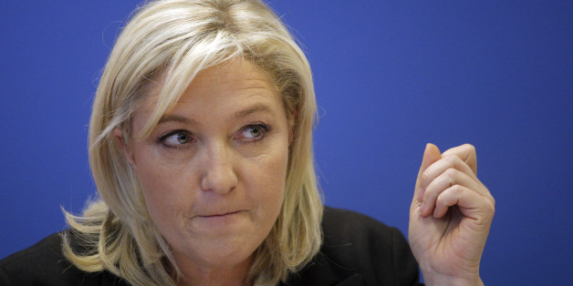 French far-right Front National leader Marine Le Pen delivers her speech during a press conference in Nanterre, outside Paris, about the recent shootings in France, Friday Jan. 16, 2015. The country is tense since 20 people, including three gunmen, were killed in last weekâs rampage. It began at the offices of satirical newspaper Charlie Hebdo. Charlie Hebdo had been repeatedly threatened for caricatures of the Muslim prophet Muhammad. (AP Photo/Christophe Ena)