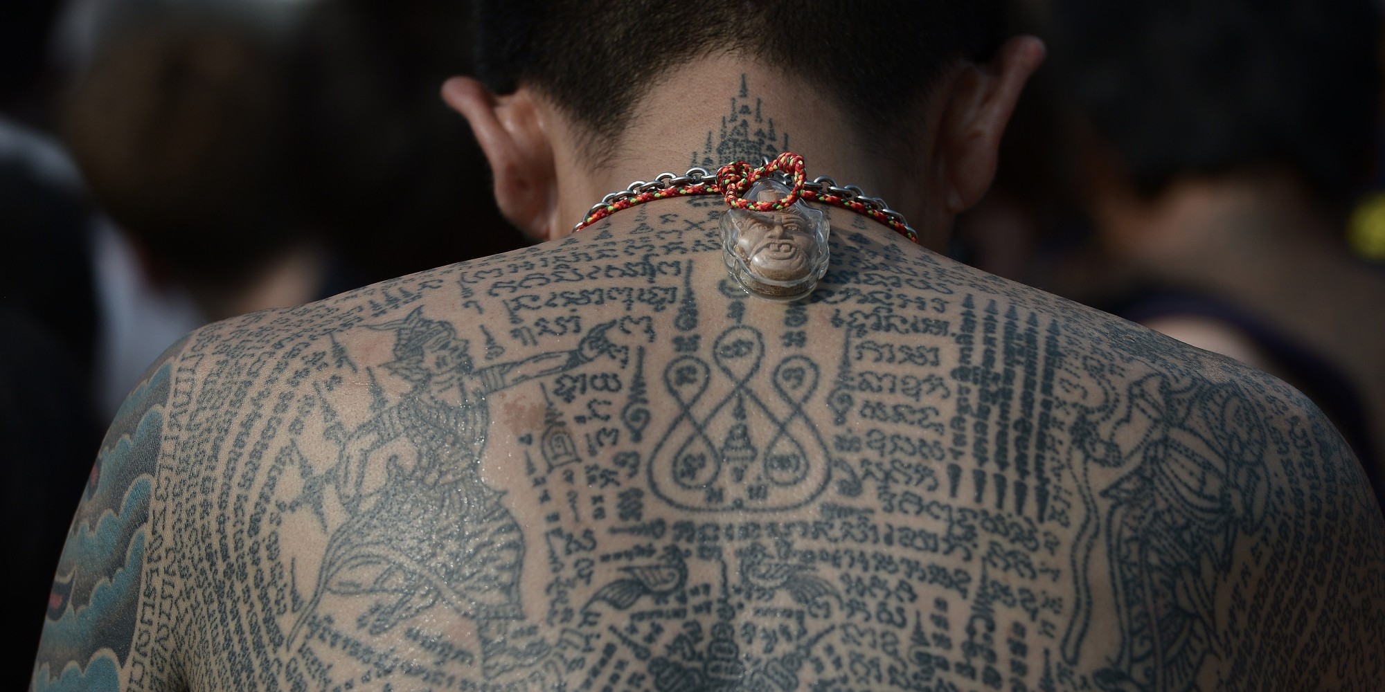Thousands Gather In Thailand To Receive Magical Tattoos From Buddhist