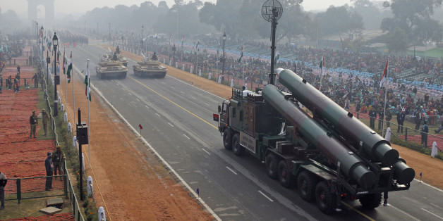 FILE- In this Jan. 23, 2011 file photo, Indian army Brahmos missile launcher passes on a flotilla towards the India Gate memorial during rehearsal for the Republic Day parade in New Delhi, India. In its race to join the club of international powers, India has reached another major milestone, it's now the world's largest weapons importer. A Swedish think tank that monitors global arms sales said Monday that India's weapons imports had overtaken China's, as the South Asian nation pushes ahead with plans to modernize its military, counter Beijing's influence and gain international prestige and clout. (AP Photo/Gurinder Osan, File)