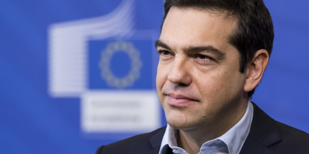 Greece's Prime Minister Alexis Tsipras addresses the media at the European Commission headquarters in Brussels Friday, March 13, 2015. (AP Photo/Geert Vanden Wijngaert)