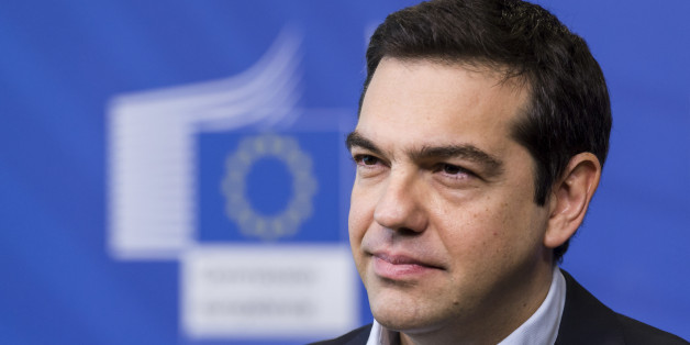 Greece's Prime Minister Alexis Tsipras addresses the media at the European Commission headquarters in Brussels Friday, March 13, 2015. (AP Photo/Geert Vanden Wijngaert)