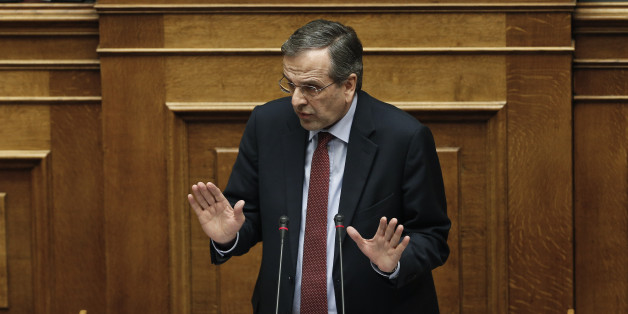 Greece's former Prime Minister Antonis speaks during a parliament session before the conference vote in Athens, on Tuesday, Feb. 10, 2015. Greece's newly elected government was due to receive a vote of confidence from the newly-elected parliament late Tuesday, and his ministers insisted they would stick to their election pledges â halting major privatization plans and reversing austerity taxes demanded by bailout lenders.(AP Photo/Petros Giannakouris)