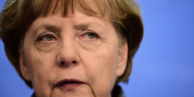 German Chancellor Angela Merkel looks on during a press conference at the end of an European Council leaders summit in Brussels on February 12, 2015. AFP PHOTO / EMMANUEL DUNAND (Photo credit should read EMMANUEL DUNAND/AFP/Getty Images)