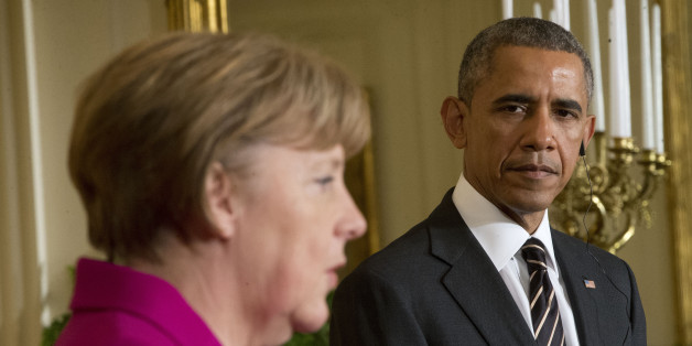 President Barack Obama listens as German Chancellor Angela Merkel speaks during their joint news conference in the East Room of the White House in Washington, Monday, Feb. 9, 2015. The leaders were expected to discuss the ongoing conflict in Ukraine, and arming Ukrainian fighters to wage a more effective battle against Russian-backed separatists. (AP Photo/Pablo Martinez Monsivais)