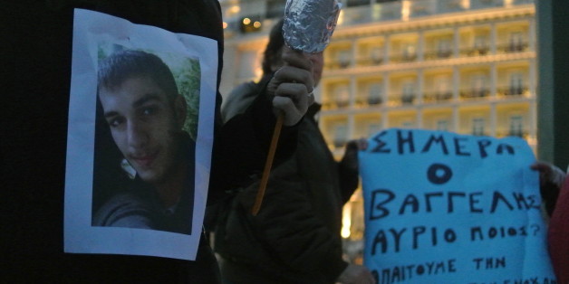 ATHENS, GREECE - 2015/03/17: People holds a candle during the vigil, they organized a vigil in Syntagma square for the 3rd day in a row in memory of Vangelis Giakoumakis a 20 y.o. student who allegedly committed suicide in Ioannina city after falling pray to bullying by his colleagues. (Photo by George Panagakis/Pacific Press/LightRocket via Getty Images)