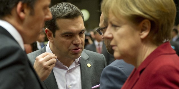 (From L) Italy's Prime minister Matteo Renzi, Greece's Prime minister Alexis Tsipras, European Parliament President Martin Schulz and Germany's Chancellor Angela Merkel talk before a working session during an European Council summit on March 19, 2015 at the Council of the European Union (EU) Justus Lipsius building in Brussels. European leaders meet for a two-day summit likely to be dominated by Greece's cash crunch and the question of whether to extend sanctions against Russia over the crisis i