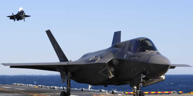 ATLANTIC OCEAN -- A variant of the Joint Strike Fighter F-35B Lighting II maneuvers after a vertical landing as the other variant approaches the flight deck for landing on the amphibious assault ship USS Wasp (LHD 1) on day thirteen of sea trials. U.S. Navy Photo By Mass Communication Specialist First Class Tommy Lamkin.