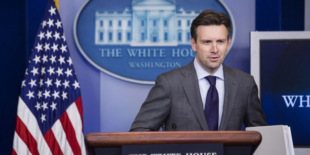 Josh Earnest, White House press secretary, speaks during the daily media briefing at the White House in Washington, D.C., U.S., on Friday, July 11, 2014. President Obama is open to working with Republicans on emergency funding to deal with child migrants at the border after the House Appropriations Committee chairman rejected the full $3.7 billion request, Earnest tolder reporters. Photographer: Drew Angerer/Bloomberg via Getty Images