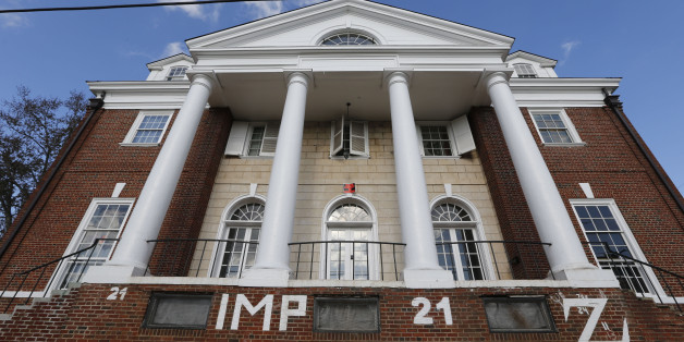 FILE - This Nov. 24, 2014, file photo, shows the Phi Kappa Psi house at the University of Virginia in Charlottesville, Va. Greek organizations at the school have until Friday, Jan. 16, 2015, to agree to new drinking rules as a condition for ending a temporary ban on social activities, which UVa. President Teresa A. Sullivan imposed following a November Rolling Stone article describing a campus culture that fosters violence against women. The article was later discredited by the magazine's editors. (AP Photo/Steve Helber, File)