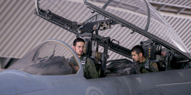 FILE - In this file photo released Wednesday, Sept. 24, 2014 by the official Saudi Press Agency, Saudi pilots sits in the cockpit of a fighter jet as part of U.S.-led coalition airstrikes on Islamic State militants and other targets in Syria that began early Tuesday in Saudi Arabia. U.S. Arab allies Egypt, Saudi Arabia, the United Arab Emirates and Kuwait are discussing creation of a military pact to take on Islamic militants, with the possibility of a joint force to intervene around the Middle