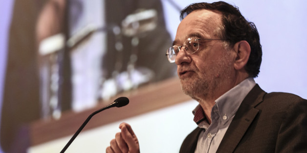 Greece's energy and environment minister Panagiotis Lafazanis addresses the audience during an energy conference in Athens, on Wednesday, March 11, 2015. Lafazanis said his new government is "radically opposed" to the privatization of "strategic sectors and businesses," particularly in the energy and infrastructure sectors. (AP Photo/Yorgos Karahalis)