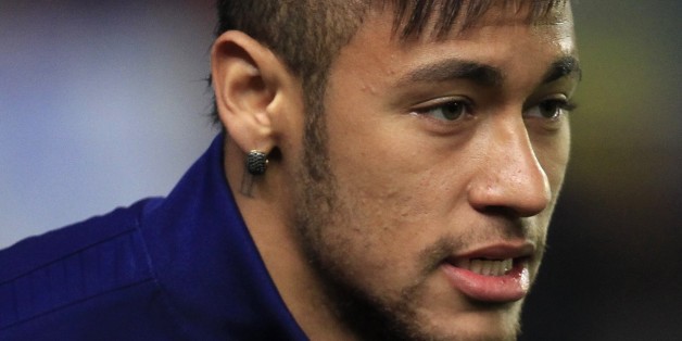 Barcelona's Neymar gestures prior to the semifinal, second leg, Copa del Rey soccer match between FC Barcelona and Villarreal at the Madrigal stadium in Villarreal, Spain, Wednesday, March 3, 2015. (AP Photo/Alberto Saiz)