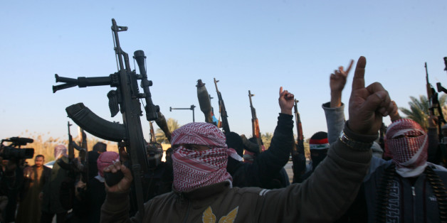 FILE - in this Tuesday, Jan. 7, 2014, file photo gunmen gather in a street as they chant slogans against Iraq's Shiite-led government and demanding that the Iraqi army not try to enter the city in Fallujah, Iraq. More than a month after jihadist militants seized control of parts of Iraqâs western Anbar province, an unsettling realization is sinking in: Iraqâs government could face a tougher time beating back an insurgency there than the hard slog the Americans faced last decade. The re