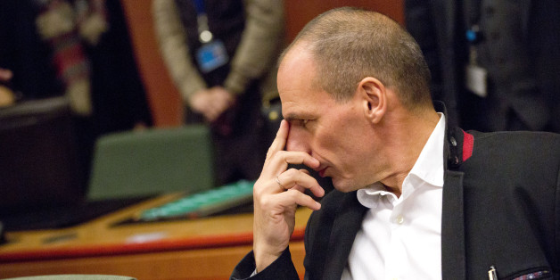 Greek Finance Minister Yanis Varoufakis waits for the start of a round table meeting of eurogroup finance ministers in Brussels on Friday, Feb. 20, 2015. Eurozone finance ministers meet for a crucial day of talks Friday to see whether a Greek debt relief proposal is acceptable to Germany and other nations using the common currency. (AP Photo/Virginia Mayo)