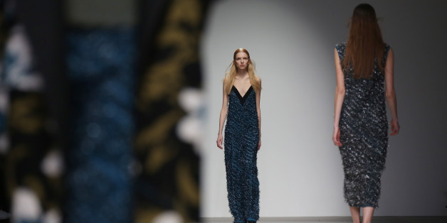 A model wears an outfit by designer Lucas Nascimento during the Autumn/Winter 2015 show at London Fashion Week in Somerset House, central London, Saturday, Feb. 21, 2015. (Photo by Joel Ryan/Invision/AP)