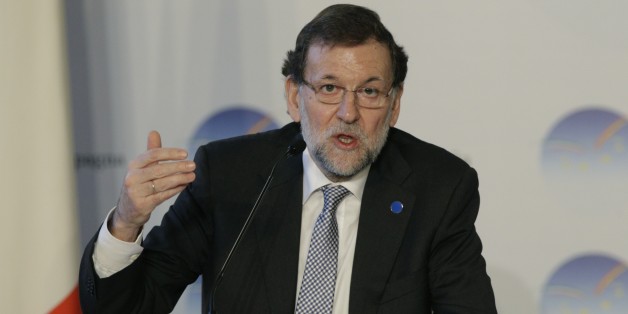 Spain's Premier mariano Rajoi talks talks to journalists during a press conference, at the end of a bilateral meeting, in Rome, Monday, Jan. 27, 2014. (AP Photo/Andrew Medichini)