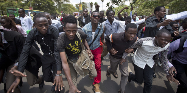 Kenyan students march in memory of the victims of the Garissa college attack and to protest what they say is a lack of security, in downtown Nairobi, Kenya Tuesday, April 7, 2015. Hundreds of Kenyan students marched through downtown Nairobi on Tuesday to honor those who died in the attack on a college by Islamic militants and to press the government for better security in the wake of the slaughter. (AP Photo/Ben Curtis)