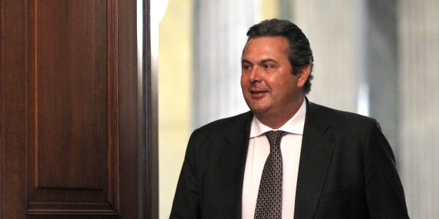 Panos Kammenos leader of the right-wing splinter Independent Greeks party arrives at the Presidential Palace for a meeting with Greek President Karolos Papoulias , in Athens, Sunday, May 13, 2012. Greek President Karolos Papoulias has called the leaders of Greece's political parties to meetings on Sunday, in a last-ditch effort to broker a deal for a coalition government. (AP Photo/Kostas Tsironis)