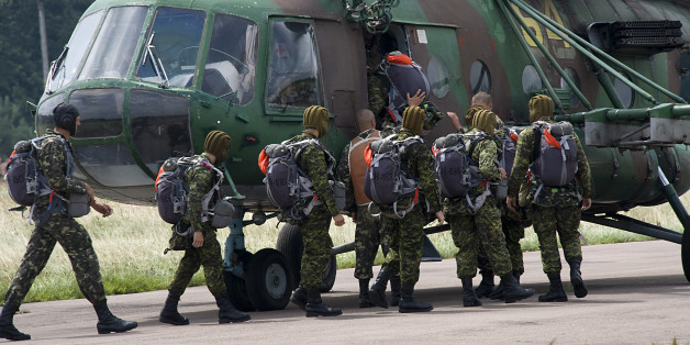 ENGLISH
IS2011-5017-09
25 July 2011
Yavoriv, Ukraine
Canadian Paratroopers from 3rd Battalion, Royal 22e Régiment, and Ukrainian Paratroopers embark on a Ukrainian MI-8 Helicopter throughout airborne operations during Exercise Rapid Trident 2011.
Thirty-one Canadian Forces paratroopers have undergone Ukrainian paratrooper training from Ukrainian paratroopers of the 80th Airborne Regiment in Lviv, Ukraine, 2011. From July 19 to 23, Canadian soldiers prepared for Exercise Rapid Trident 2011 where they will use Ukrainian paratrooper equipment and aircraft, a first for any NATO country.
Rapid Trident 2011 is an exercise held from July 25 to August 5, 2011, that involves approximately 1,600 personnel from 13 NATO and Partnership for Peace member nations: Belarus, Estonia, Georgia, Latvia, Lithuania, Moldova, Poland, Serbia, Slovenia, Ukraine, the UK, USA and Canada. This year, Exercise Rapid Trident 2011 consists of a multi-national airborne operation and field training exercise that is hosted by Ukraine in support of Ukraineâs Annual National Program to achieve interoperability with NATO. The complete Canadian delegation is represented by 25 paratroopers from C Company, 3e Battalion Royal 22e Régiment, augmented by four reserve paratroopers, two parachute riggers from Canadian Forces Land Advanced Warfare Center and one medical technician from 5 Field Ambulance with paratrooper qualifications, and representatives of ADM (Pol) and ADM (PA), for a total of 35 personnel. Canadian soldiers are participating only in the first week of Exercise Rapid Trident 2011 where, along with troops from Partnership for Peace countries, they will jump from Ukrainian Illusion 76 aircraft and MI-8 helicopters. Held at the International Peacekeeping and Security Center in Yavoriv, Ukraine, Exercise Rapid Trident 2011 is designed to enhance joint combined interoperability with allied and partner nations to achieve common goals of security, stability and peace.
Photo by Corporal Jax Kennedy, Canadian Forces Combat Camera © 2011 DND-MDN Canada®