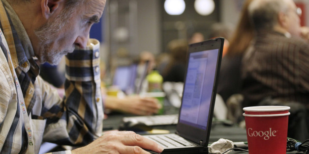 A man works on a laptop Google at Google offices, Oct. 17, 2012 in New York. (AP Photo/Mark Lennihan)