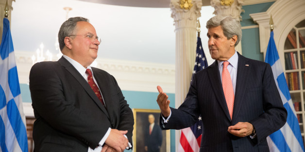 Secretary of State John Kerry, accompanied by Greek Foreign Minister Nikos Kotzias, speaks to members of the media before a meeting at the State Department in Washington, Monday, April 20, 2015. (AP Photo/Andrew Harnik)