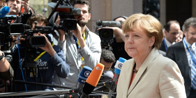 Germany's Chancellor Angela Merkel arrives at the European Council headquarters for an extraordinary summit of European leaders to deal with a worsening migration crisis, on April 23, 2015 in Brussels. European leaders gather on April 23 to consider military action, at an extraordinary summit to deal with a worsening migration crisis after a series of deadly shipwrecks in the Mediterranean. AFP PHOTO / THIERRY CHARLIER (Photo credit should read THIERRY CHARLIER/AFP/Getty Images)