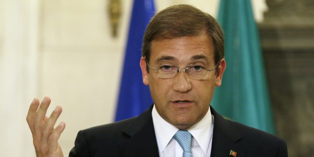 Portuguese Prime Minister Pedro Passos Coelho makes statements to the media after his meeting with Greek Prime Minister Antonis Samaras at the Maximos Mansion in Athens on Tuesday, Sept. 9, 2014. Coelho is expected to discuss post-bailout growth strategies with Greek officials. (AP Photo/Thanassis Stavrakis)