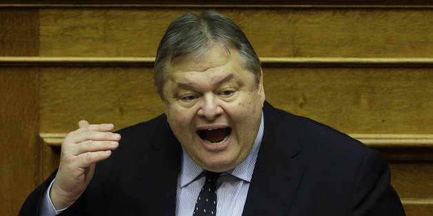 This photo taken on Sunday, Dec. 7, 2014 shows leader of Pasok (Panhellenic Socialist Movement) Evangelos Venizelos, 58, speaks during a parliament meeting for a vote on the country's 2015 budget in Athens. Greece goes to the polls on Sunday, Jan. 25, 2015 in a snap general election as the country was showing tentative signs of emerging from a deep financial crisis that has disturbed the eurozone. The vote, held more than a year early, has once more raised the specter of Grexit _ a Greek exit from Europeâs joint currency. (AP Photo/Thanassis Stavrakis)