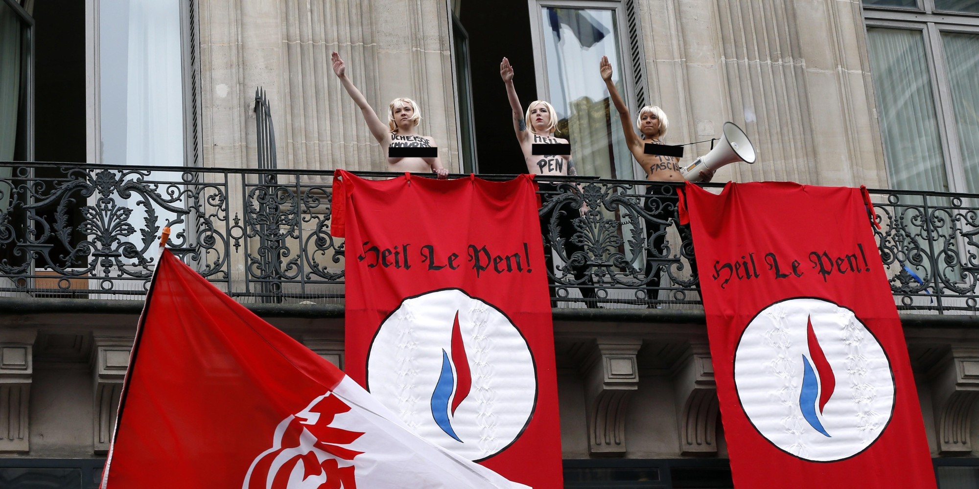 Topless Femen Activists Disrupt May Day Speech By France S Le Pen