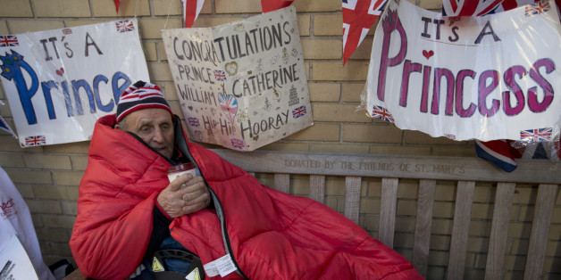 Royal fan Terry Hutt enjoys a hot drink as he celebrates his 80th birthday outside the Lindo Wing of St Mary's Hospital, as he continues his vigil waiting for Kate, Duchess of Cambridge to arrive at the hospital, in London, Thursday, April, 30, 2015. Kate is due to give birth late April to her second child, at St Mary's. (AP Photo/Alastair Grant)