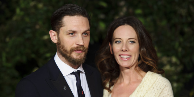 Tom Hardy and Kelly Marcel arrive for the British Academy Film Awards 2014 After Party at the Grosvenor Hotel, in central London, Sunday, Feb. 16, 2014. (Photo by Jonathan Short/Invision/AP)