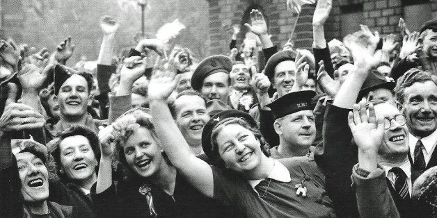 Jubilant crowds in Parliament Street celebrate the end of the war in Europe on the 8th May 1945.